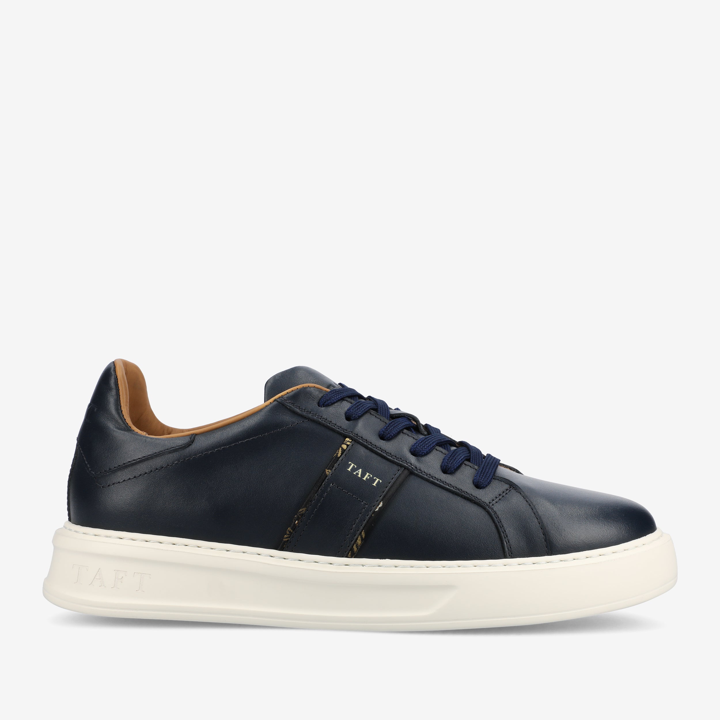 LOGAN-NVY_WEB1_3d5211ef-0b6f-4132-9f0a-4c84d3bf4847.jpg The Logan Sneaker in Navy - Image 1